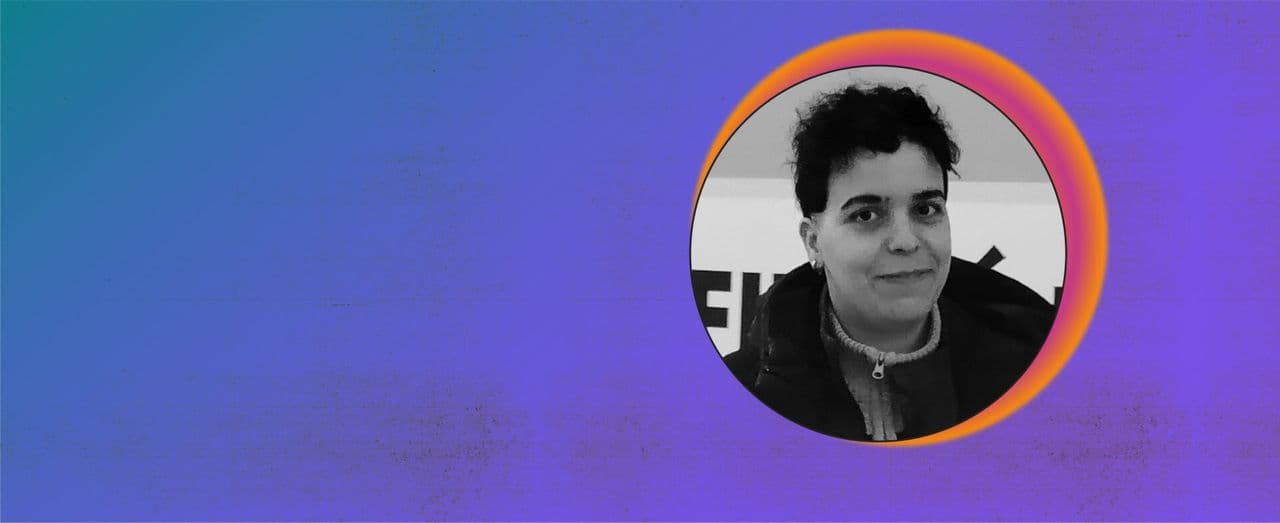 Black-and-white portrait of a person against a blue and purple background.