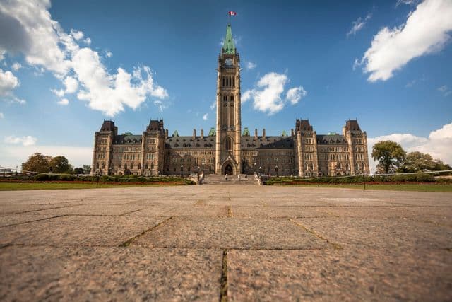  Parliament Building with Peace Tower on Parliament Hill in Ottawa, Canada